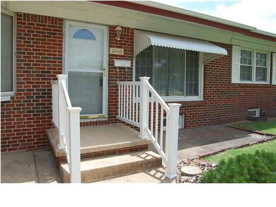 Nice front entry with a concrete front patio