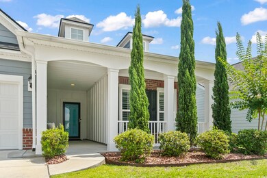 Doorway to property featuring a porch