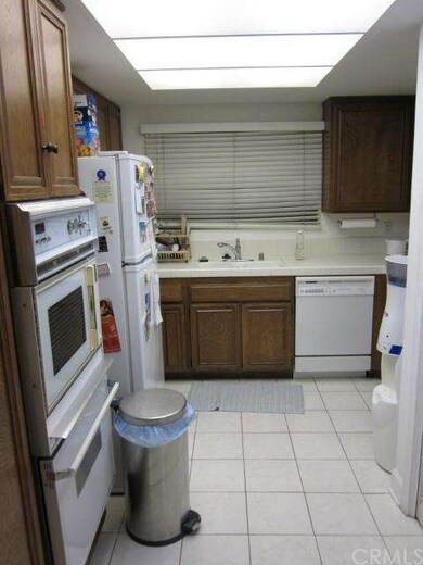 View of kitchen including dishwasher