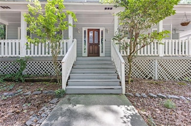 Property entrance featuring covered porch