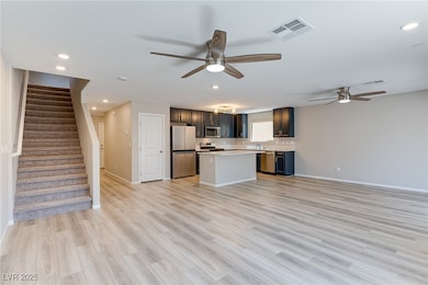 Kitchen with appliances with stainless steel finis