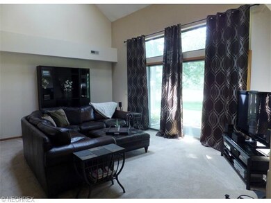 Cozy great room with gas fireplace, natural light 