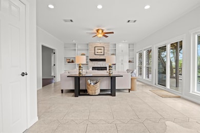 Kitchen with a fireplace, ornamental molding, cei