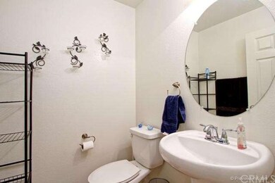 Half Bathroom by Front Entry & Bonus Room :  appro