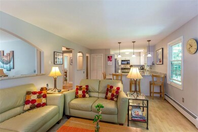 Kitchen opens to cozy den with...