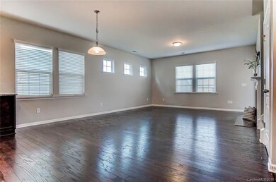 Great Room and Breakfast Area with Wood Flooring