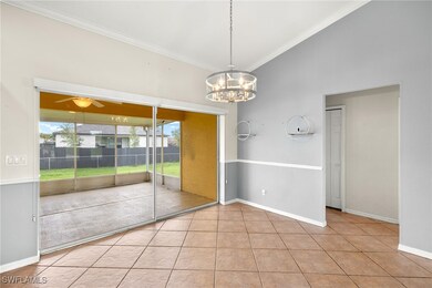 Tiled spare room with a ceiling fan, ornamental mo