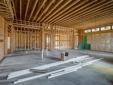 Looking over the kitchen towards living and primary bedroom.