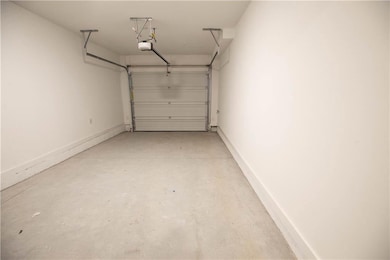 HUGE Car Garage providing endless options for overhead storage