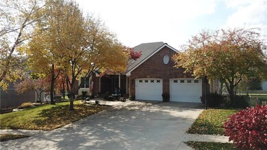 Cedar Fence, Beautiful Trees, and Stone Landscaping, newer Vinyl Clad Soffits Extra Vents, Terraced Lighted Landscaping, Insulated Garage Doors w Windows!