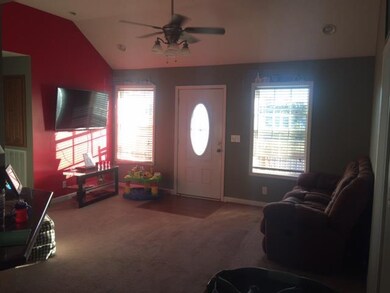 Open Living Room with cathedral ceilings. 