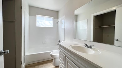 Bathroom featuring bathing tub / shower combinati