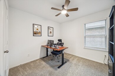 Versatile room currently serving as a home office,
