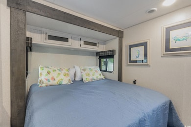 View of master King bedroom from Tv and Door