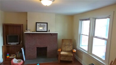 Living room with decorative fire place