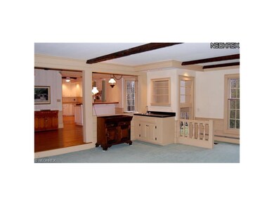 Family Room with fireplace, wetbar and access to b