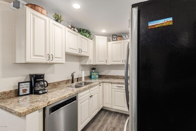 Open kitchen with granite counters