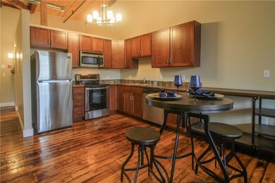 Another view of the upgraded and large kitchen.