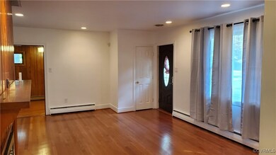 Entryway with hardwood floors