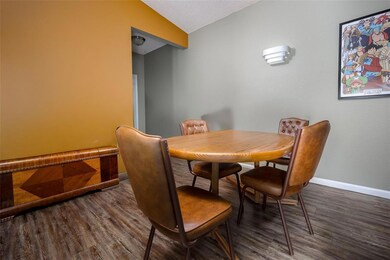 Nicely-sized dining area adjacent to the kitchen and living area.