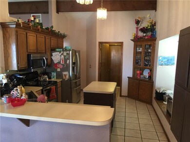 KITCHEN HAS ISLAND, BREAKFAST BAR, BUILT IN CORNER