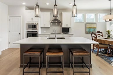 Gourmet kitchen with quartz countertops and stainless steel appliances