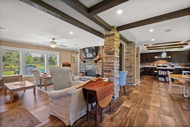 Great room with exposed beams
