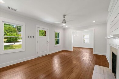 Spacious living room with decorative fireplace