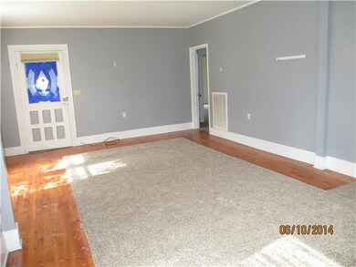 Large living/dining room with new carpet & HW