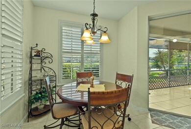 Dining space featuring light tile patterned floors