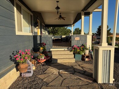 Covered porch with a ceiling fan