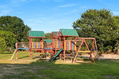 Community play area with a lawn