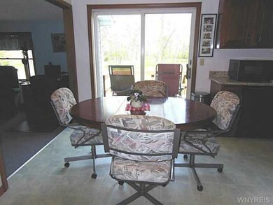 Kitchen Dining. Sliding glass doors to deck.