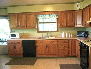 Kitchen. The window above the sink looks out to th