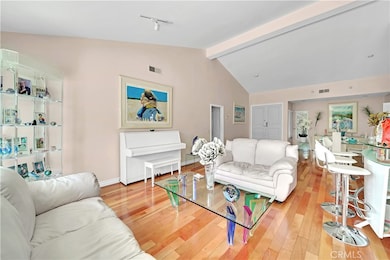 Living Room View of Entry Door and Dinning Area.