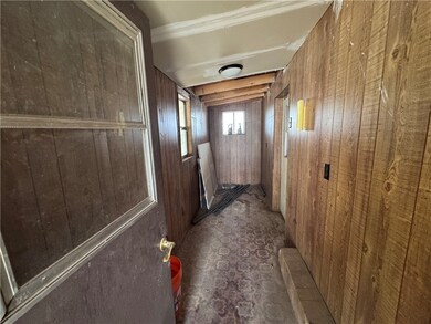 Hall with wood walls