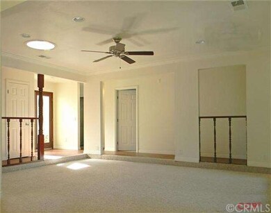 Formal Living room with lots of natural light.