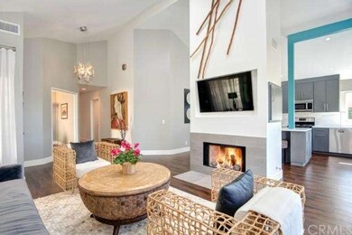 Entry features Possini hand blown glass chandilier