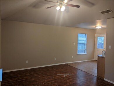 Unfurnished room featuring dark hardwood / wood-st