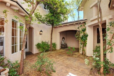 Courtyard with multiple access doors into the hous