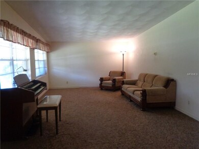 Living Room is 23x14, with beautiful scalloped vaulted ceiling!