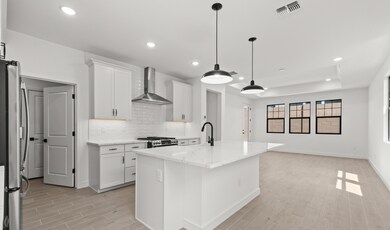 Kitchen with matte black pendant lighting