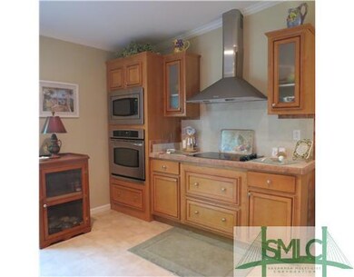 Exterior Front. Stainless appliances, flat cooktop