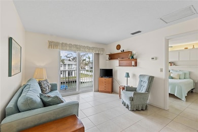 As you step inside, you’re welcomed by an open layout that leads to the private balcony, where you can enjoy breathtaking canal views with boats docked along the water