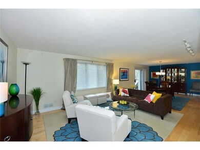 Stunning living room with newly added hardwood