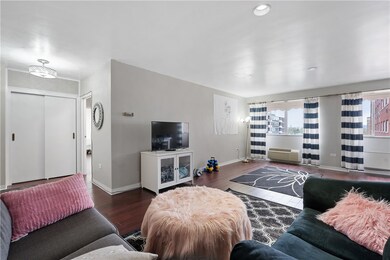 The living room of this Condo features a large ope