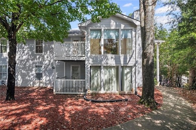 Rear view of property with a chimney