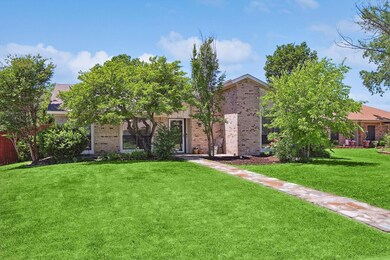 View of front facade with a front yard