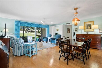 Huge Living/Dining area overlooking the 18th green opening to your private screen porch