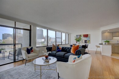 Spacious and open living area with spectacular views of downtonw Tulsa.
